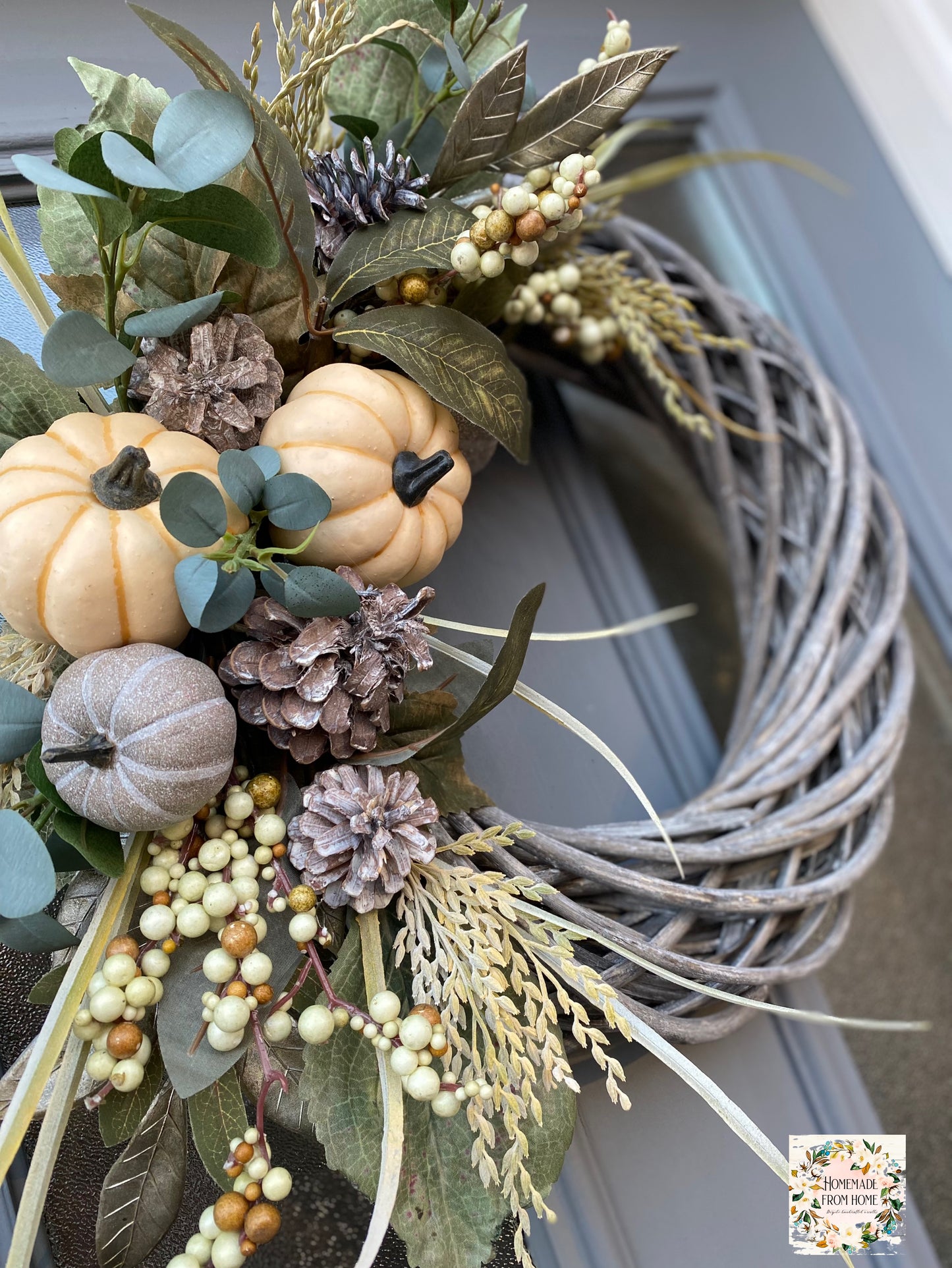 Grey pumpkin and rice flower signature wreath