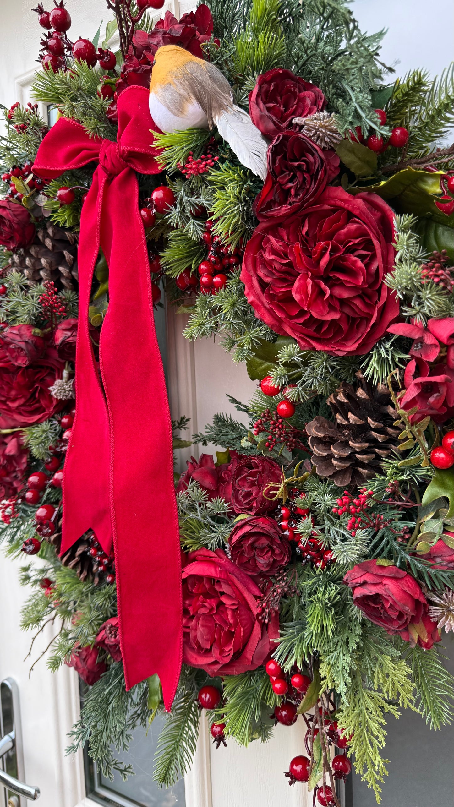 Rouge robin Christmas wreath