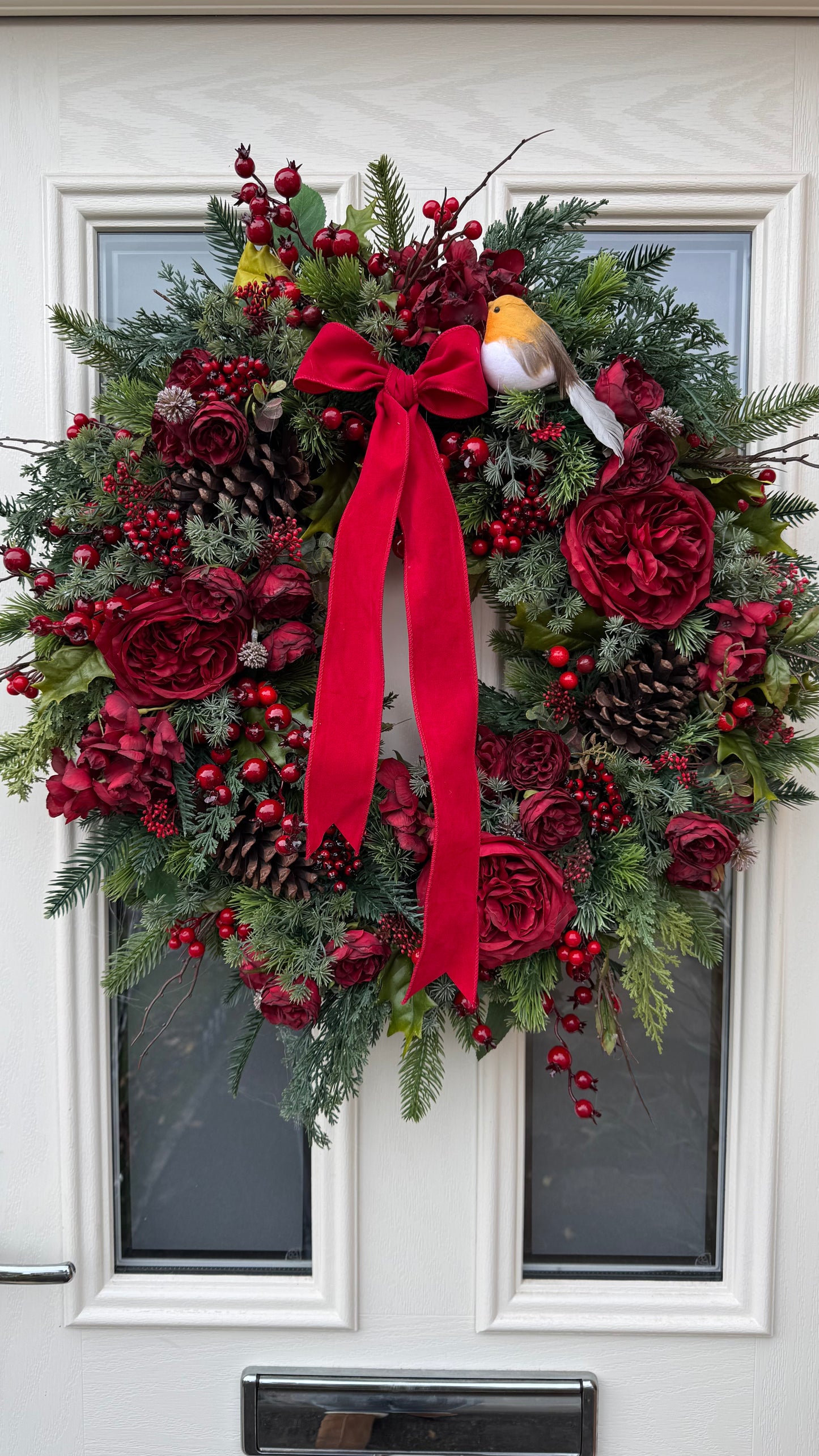 Rouge robin Christmas wreath