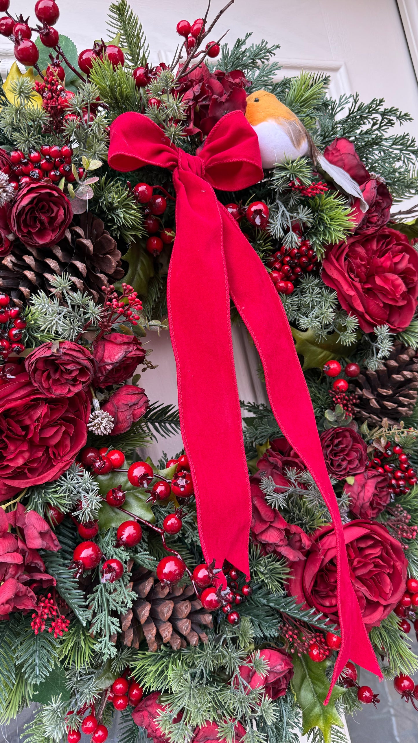 Rouge robin Christmas wreath