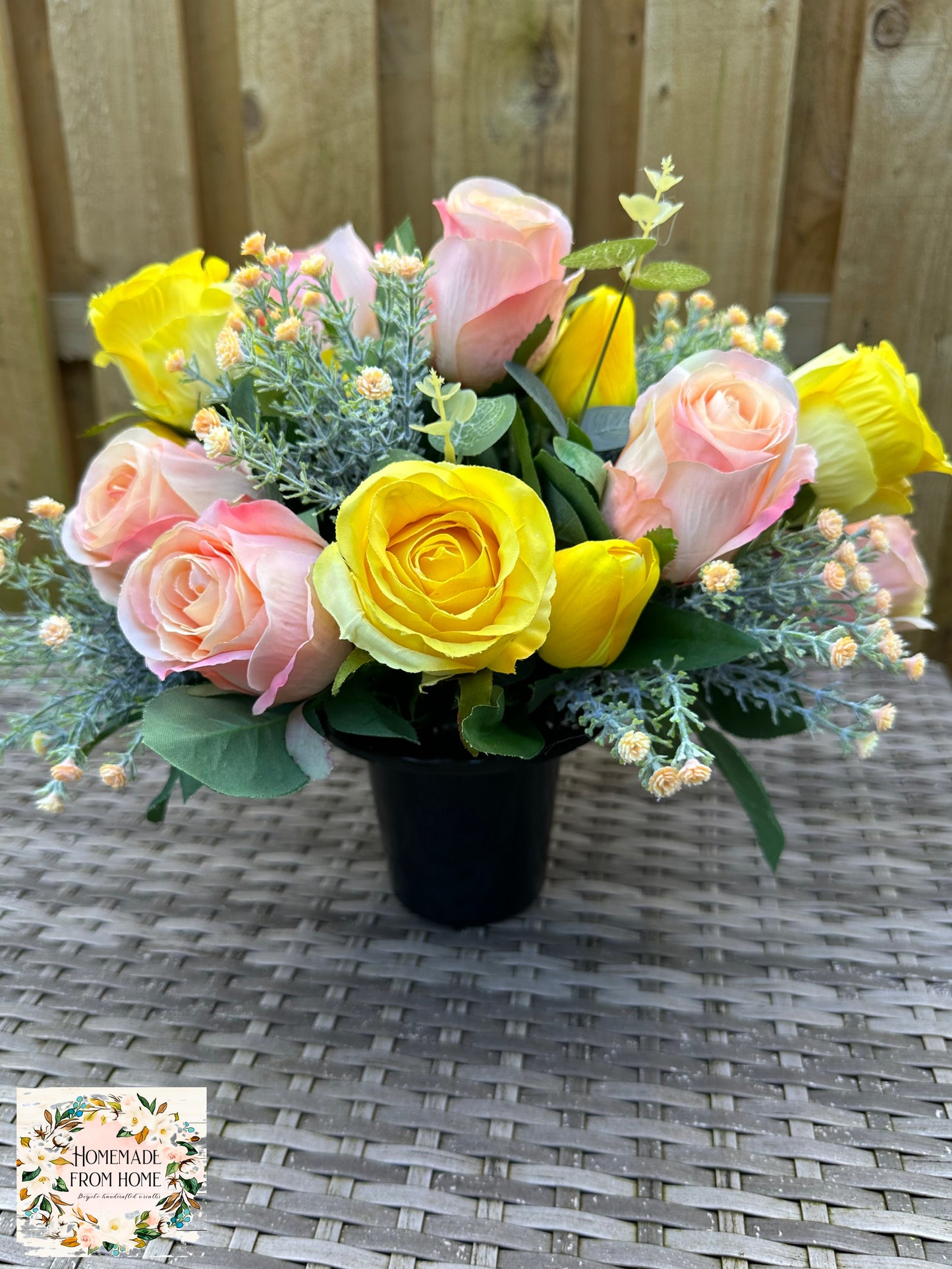 Pink rose and yellow tulip cemetery pot