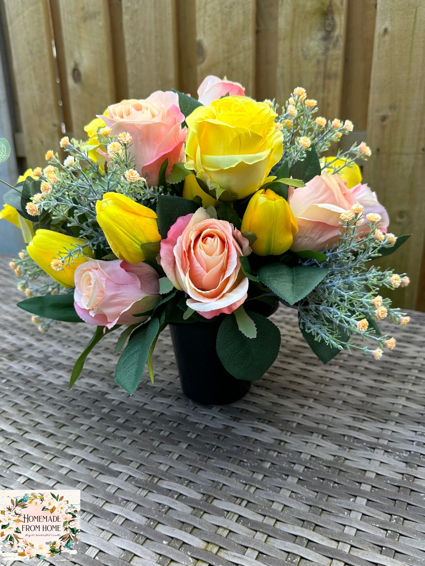Pink rose and yellow tulip cemetery pot