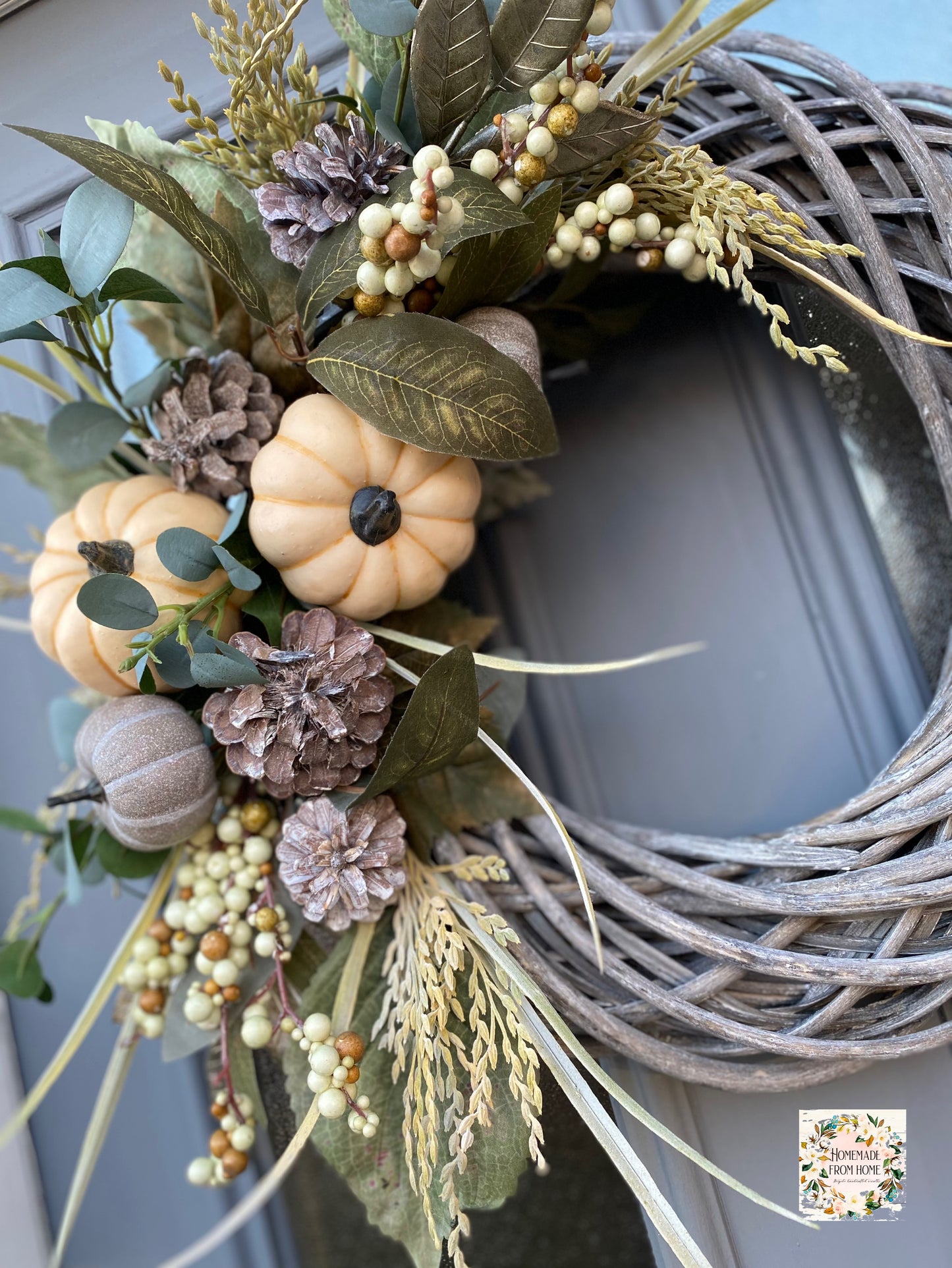 Grey pumpkin and rice flower signature wreath