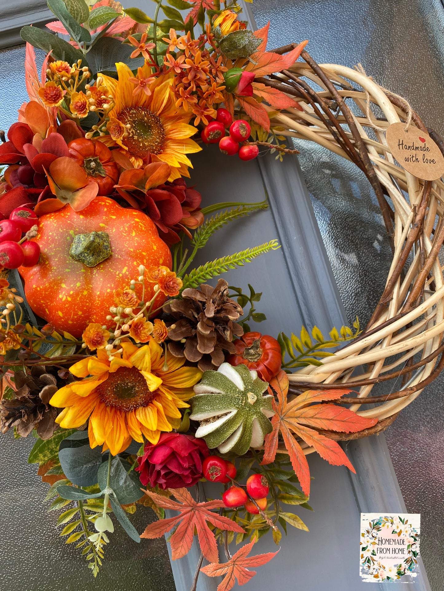 Pumpkin and sunflower wreath